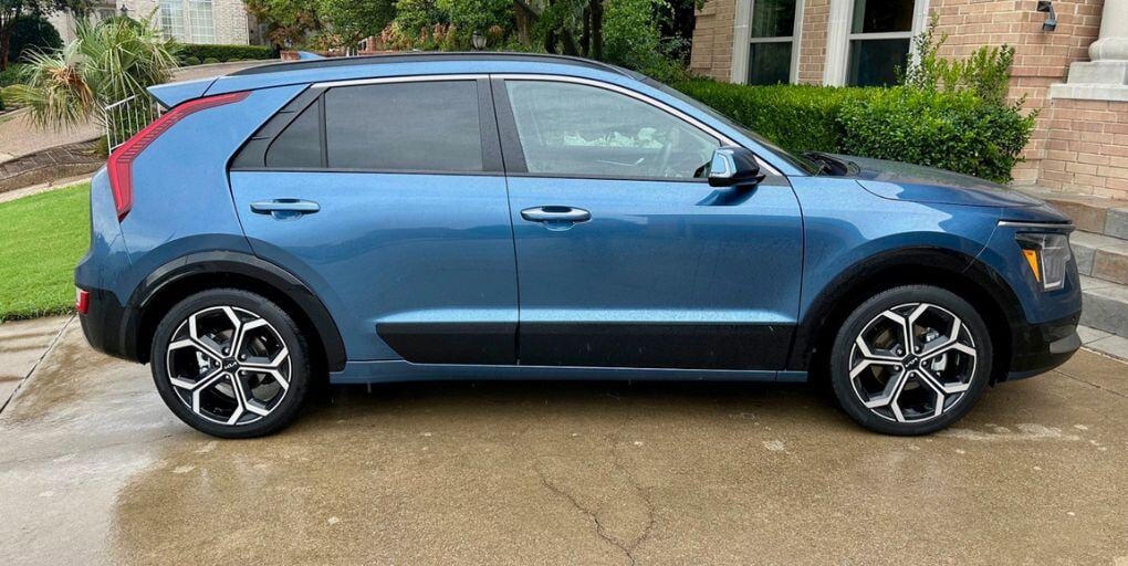 2024 Kia Niro SX Touring Hybrid in Mineral Blue. Credit: CarPro.