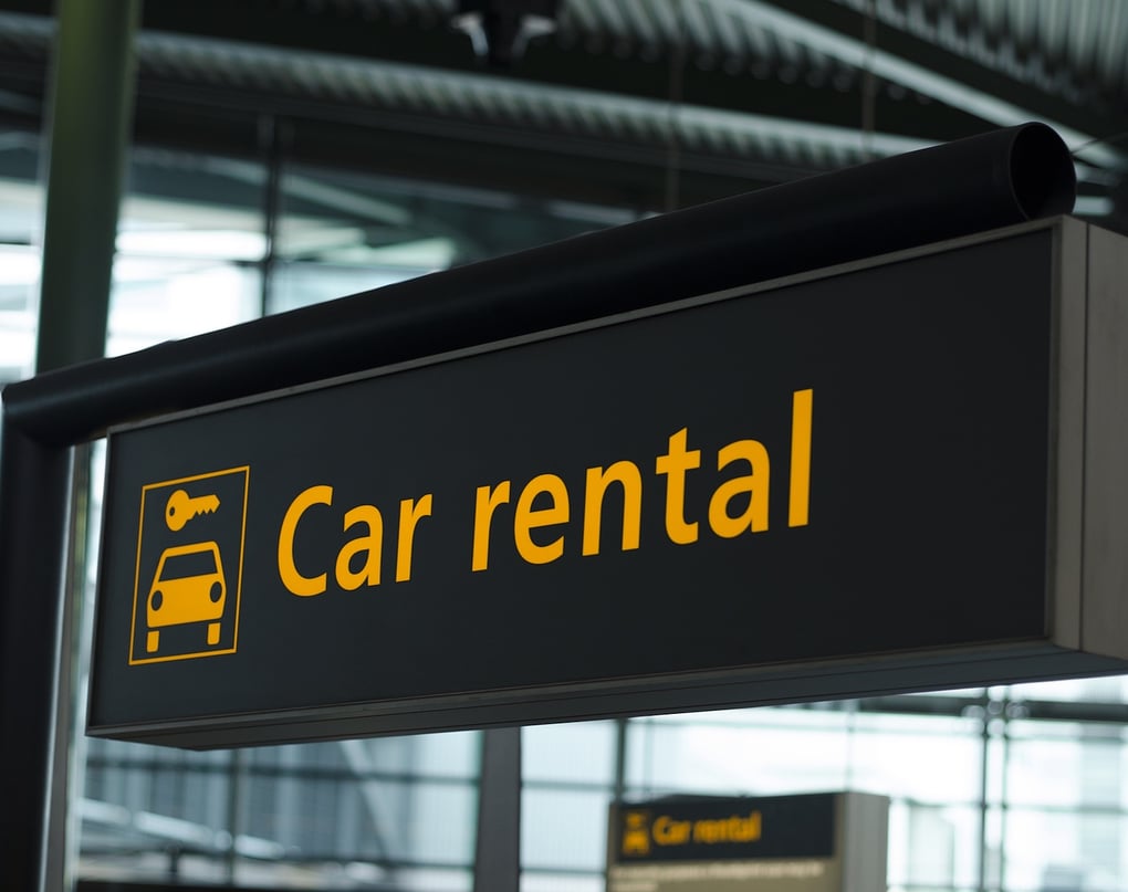 car rental sign at airport