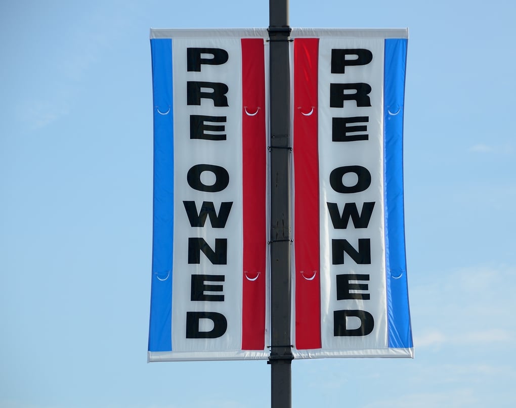 pre-owned sign