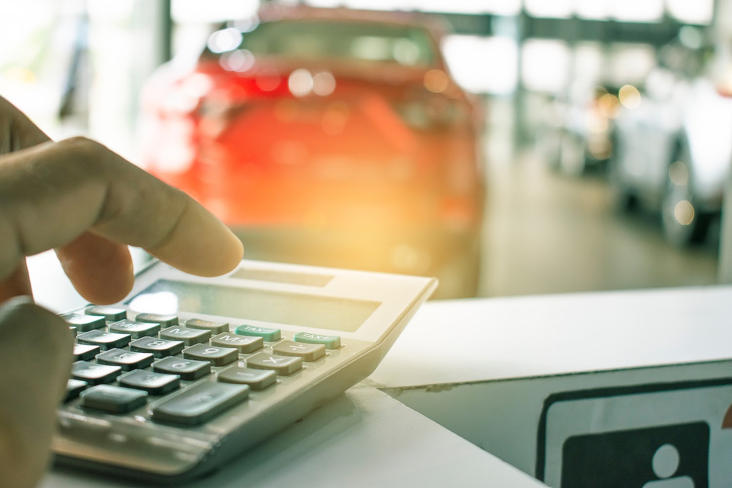 Calculator at car dealership